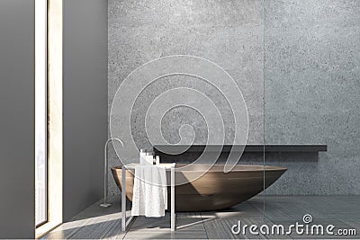 Interior of a bathroom with a narrow window, wooden tub, concrete walls and a long shelf. Stock Photo