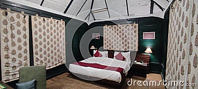 Interior of a bedroom of a luxury holiday jungle resort Editorial Stock Photo