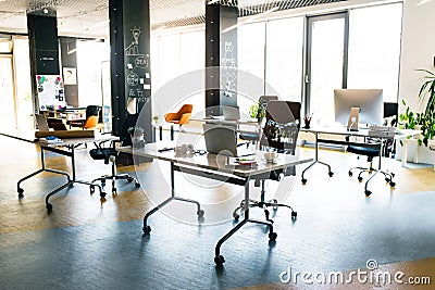 The interior of big bright empty modern office after work. Stock Photo