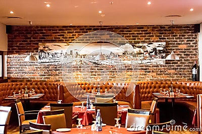 Interior of Booth style Restaurant Diner with Brown Interior Editorial Stock Photo