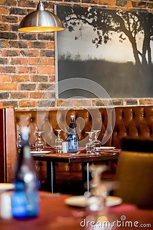 Interior of Booth style Restaurant Diner with Brown Interior Editorial Stock Photo