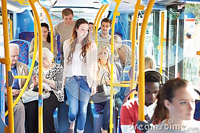 Interior Of Bus With Passengers Stock Photo