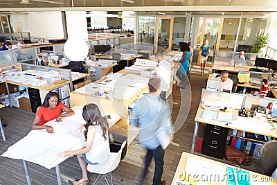 Interior Of Busy Modern Open Plan Office Stock Photo