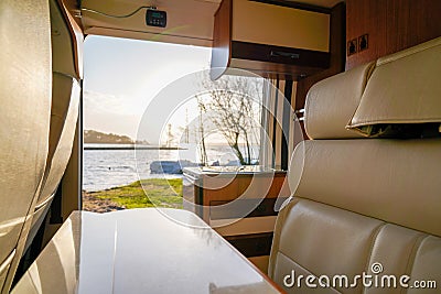 Interior Camper van rv sunrise in spot park like vanlife in summer at Lacanau lake France Stock Photo