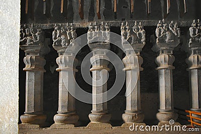 Interior of Chaitya Hall Carved Octagonal pillars at Karla Caves, these was constructed between 50 and 70 CE, and 120 CE, located Stock Photo