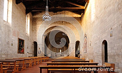 Interior of Collegiata di Sant'Agata church in Asciano (Siena) Stock Photo