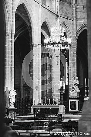 Interior of Cologne Cathedral with glowing candles Editorial Stock Photo