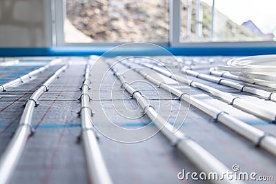 Close-up of pipes for hydronic underfloor heating Stock Photo