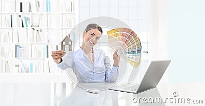 Interior design concept smiling woman showing color palette and Stock Photo