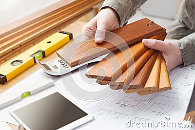 Interior designer choosing a baseboard Stock Photo