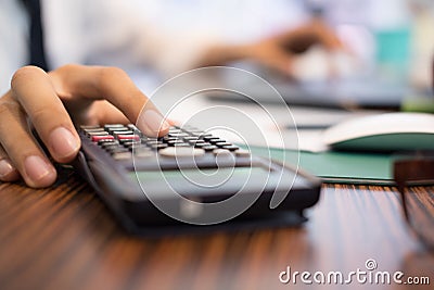 interior designer drawing on graphic tablet at office. artist working with calculator at workplace. architect sketch construction Stock Photo