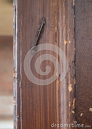 Old Jewish mezuzah on the door of a shabby dilapidated traditional Georgian Huguenot townhouse at Princelet Street, London UK Stock Photo