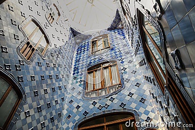 Barcelona, Spain - July 5, 2016:Interior details of the tiled walls and interior windows Casa Battlo in Barcelona Editorial Stock Photo