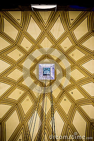 Interior of the dome of the Mole Antonelliana seeing in detail its decoration and in the center the hole of the elevator. Editorial Stock Photo