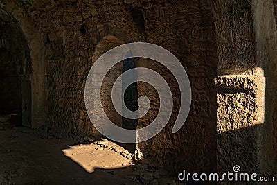 Interior of a dungeon of some ancient ruins Stock Photo