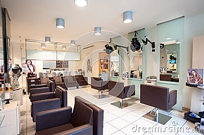 Interior of an empty hair salon showing the decor Editorial Stock Photo