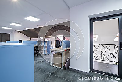 Interior in empty work mansard room in modern office or coworking Stock Photo