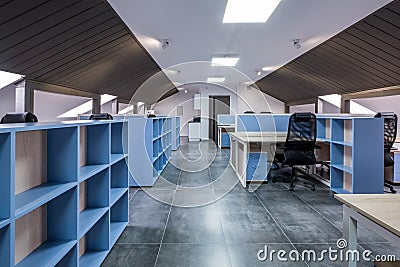 interior in empty work mansard room in modern office or coworking Stock Photo
