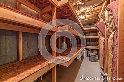 Interior of food cold storage with wooden racks and insulated wall and ceiling Stock Photo