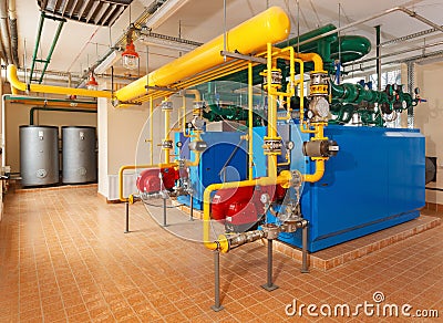 Interior gas boiler house with a lot of industrial boilers, pipe Stock Photo