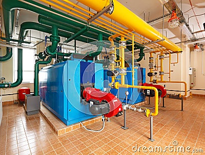 Interior gas boiler house with a lot of industrial boilers, pipe Stock Photo