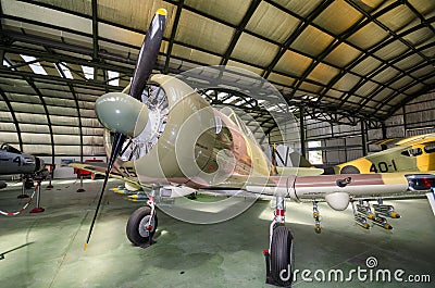 Interior of an hangar with some rare vintage interceptor airplanes Editorial Stock Photo