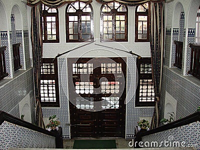 The interior of the historic building in Algeria, steep stairs and wood crafting remarkable Stock Photo