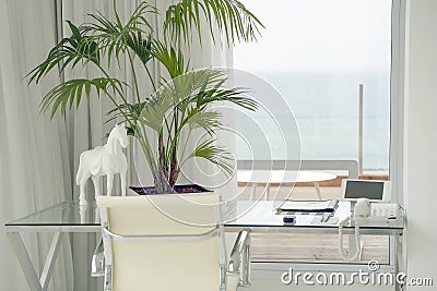 Beautiful writing desk. Modern interior of the office in a luxury villa Stock Photo