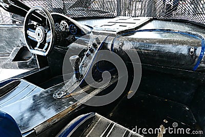 Interior of junkyard masterwork replica of Bugatti Chiron sport car made of scrap metal Editorial Stock Photo