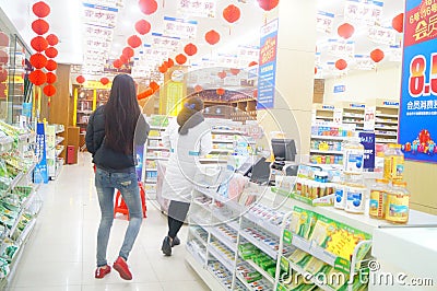 The interior landscape of a drugstore, a statue of a deer Editorial Stock Photo