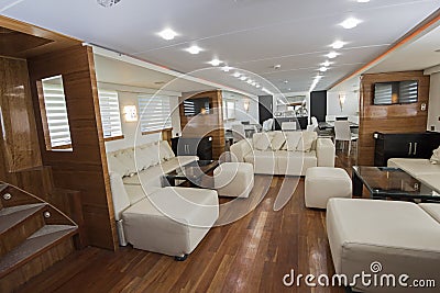 Interior of large salon area of luxury motor yacht Stock Photo