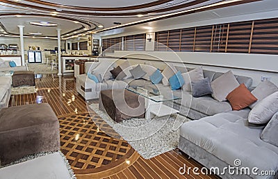 Interior of large salon area of luxury motor yacht Stock Photo