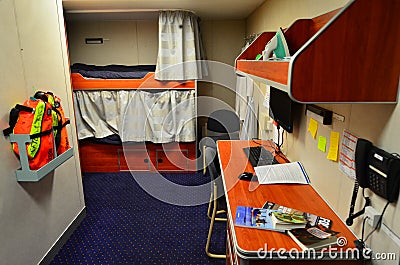 Interior of a living cabin with bunk beds on Naval ship patrol boat Editorial Stock Photo
