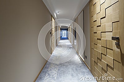 Interior of a long hotel corridor Stock Photo