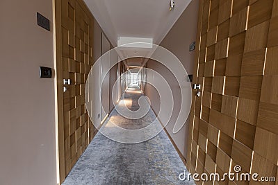 Interior of a long hotel corridor Stock Photo