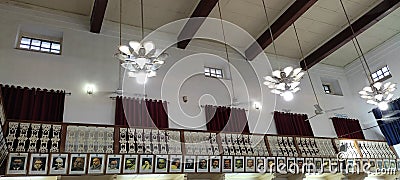 Interior of Madhya Bharat Hindi Sahitya Samiti auditorium in Indore decorated with the pictures of celebrates hindi authors Editorial Stock Photo