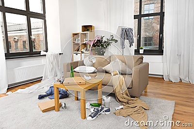 Interior of messy home room with scattered stuff Stock Photo