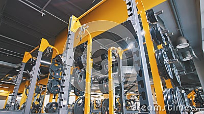 Interior Of Modern Fitness Gym - a lot of modern athletic trainer Stock Photo