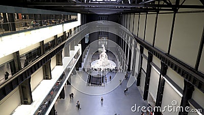 Interior of modern University. Action. Beautiful internal architecture of modern building of University with fountain in Editorial Stock Photo