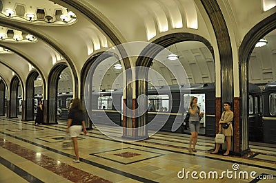 An interior of Moscow metro station. Ornamental ceiling, marble floors. Editorial Stock Photo
