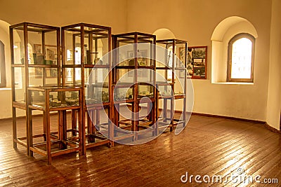 Interior of a museum with wooden shelves Editorial Stock Photo