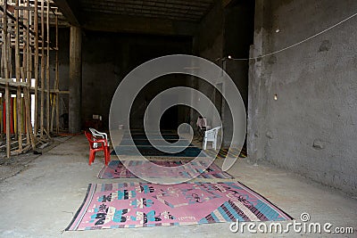 Interior of a new mosque under construction, building a new grand Masjid mosque in Cairo, with a big dome and high minaret, wooden Stock Photo