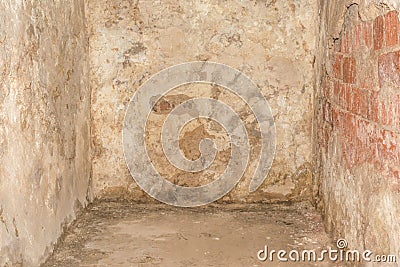 Interior of an old abandoned house with ruined walls Stock Photo