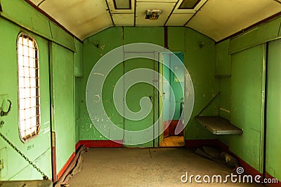 Interior of an old train carriage for transporting prisoners Editorial Stock Photo
