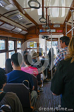 Interior of one of the trams that circulate through the streets of Lisbon, Portugal Editorial Stock Photo