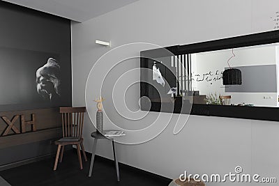 Interior with pictures of the horses on the monochrome wall Editorial Stock Photo
