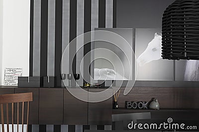 Interior with pictures of the horses on the monochrome wall Editorial Stock Photo