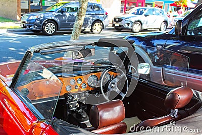 Interior of red convertible jaguar designed of left side driving parked on street on Bribie Island Queensland Australia circa 9-2 Editorial Stock Photo