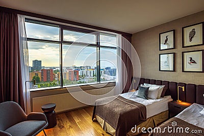 Interior of a room with city view in Grand Hotel Reykjavik, Iceland Editorial Stock Photo