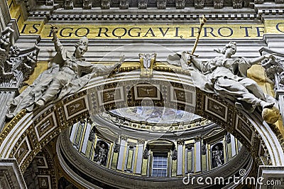 Interior of Saint Peter`s Basilica, closeup of arch figures Editorial Stock Photo